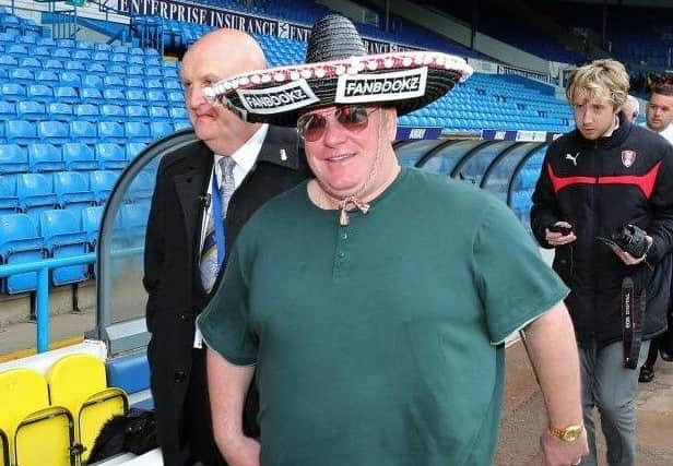 On the beach: Millers chief Steve Evans dons a sombrero at Elland Road.