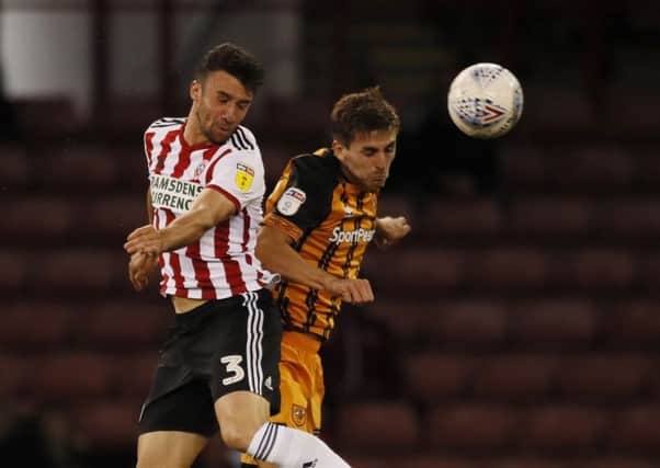 Enda Stevens of Sheffield United and Robbie McKenzie of Hull City during the Carabao Cup 1st Round match at the Bramall Lane Stadium, Sheffield. (Picture: Simon Bellis/Sportimage)