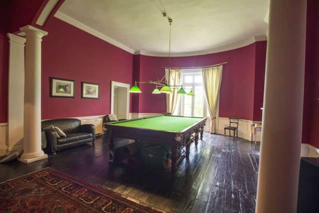 The communal rooms on the ground floor include a snooker room with full-size table