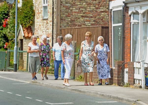 Sylvia Bartle, Jeanette Martin, Coun Ros Jump, Sandra Martin, Jean Dex, and Jean Kendal walking through Dunswell, near Beverley, a village in Yorkshire that has the most rapidly ageing population.  Picture Tony Johnson.