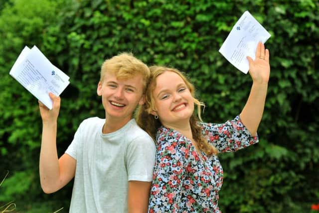160818    George Cooper 18 ( 1 A star   2A's)  who is going to Cambridge to study Spanish and Arabic  with Jessie Meyer 17  (4 A star 1A)  who is goint to Nottingham to study Medicine ,  pupils at Bootham School in York celkebrate their A level results at the school.