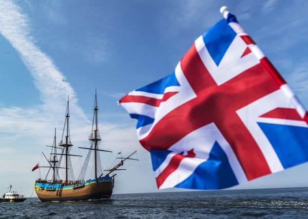 HM Bark Endeavour, a full-scale replica of Captain Cook's ship, is pulled by a tugboat from Middlesbrough to its permanent home in Whitby in June. Picture: Danny Lawson/PA Wire