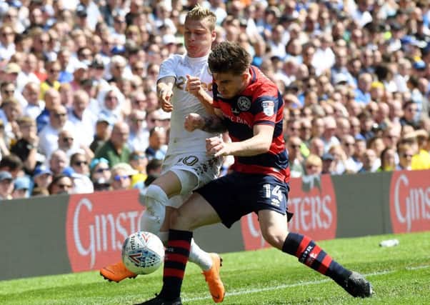 Back to Elland Road: Leeds 
United's Gianni Alioski battles with QPR's Ryan Manning, who is now at Rotherham.