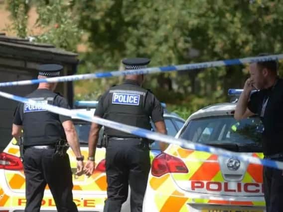 The scene on Langsett Close, Upperthorpe, following the fatal stabbing. Picture: Chris Etchells