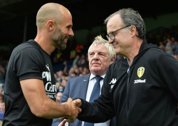 Friendly foes: Millers chief Paul Warne, left, meets Leeds United head coach Marcelo Bielsa. Picture: Bruce Rollinson