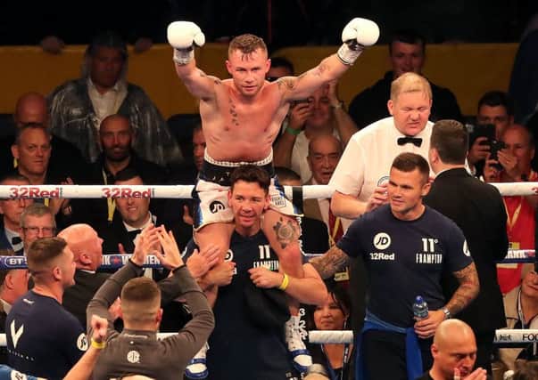 Carl Frampton is hoisted on the shoulders of a member of his team after victory over Luke Fletcher in Belfast set up a world title fight with Yorkshireman Josh Warrington. (Picture: PA)