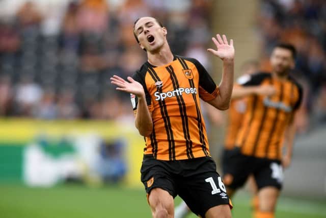 Jackson Irvine, of Hull City, reacts after a tackle.