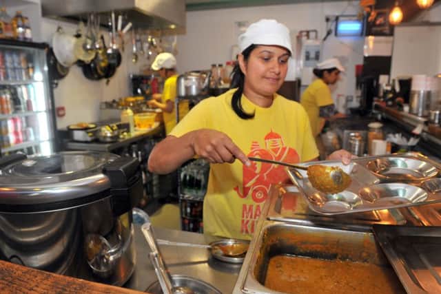 090818  Manjit Kaur  at work  at Manjit's kitchen in Leeds Kirkgate Market.