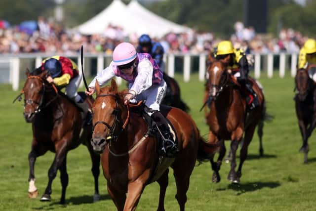 Baccarat and George Chaloner win at Royal Ascot in 2014.