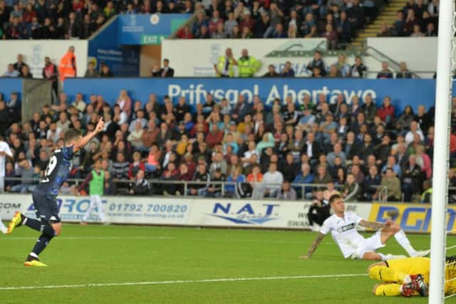Pablo Hernandez turns to celebrate his equaliser against Swansea City.  Picture Bruce Rollinson