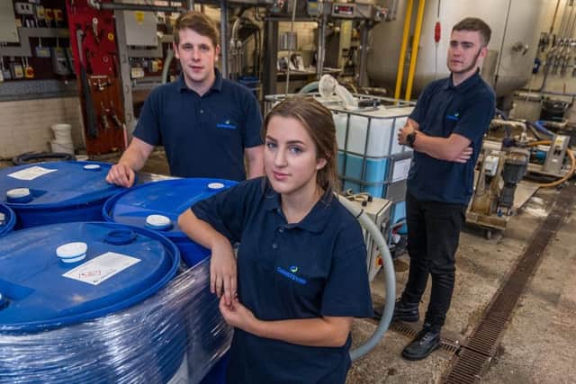 Date: 21st August 2018.
Picture James Hardisty.
Christeyns  Rutland Street, Bradford, has a successfull apprenticeship programme. Pictured Luke Chadwick, a former apprentice now full-time as a Production Planner, Lucy Duckworth, and Adam Brookfield, both taking part in the apprenticeship scheme.