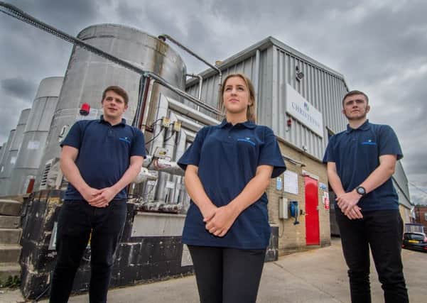 Date: 21st August 2018.
Picture James Hardisty.
Christeyns  Rutland Street, Bradford, has a successfull apprenticeship programme. Pictured Luke Chadwick, a former apprentice now full-time as a Production Planner, Lucy Duckworth, and Adam Brookfield, both taking part in the apprenticeship scheme.