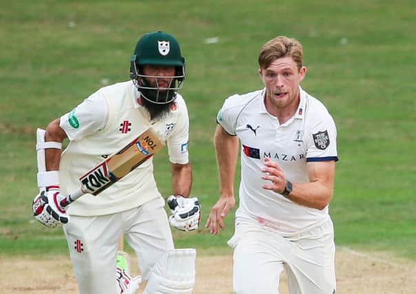 UPS AND DOWNS: Yorkshire's David Willey and Worcestershire's Moeen Ali. Picture: Alex Whitehead/SWpix.com