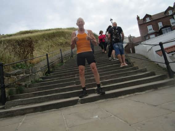 Karl Wittering pictured at the steps ready to take on the challenge