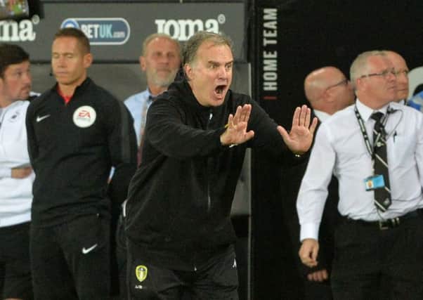 STICK TO THE PLAN! Leeds United boss Marcelo Bielsa shouts instructions to his players duringnthe 2-2 draw at Swansea City.  Picture: Bruce Rollinson.