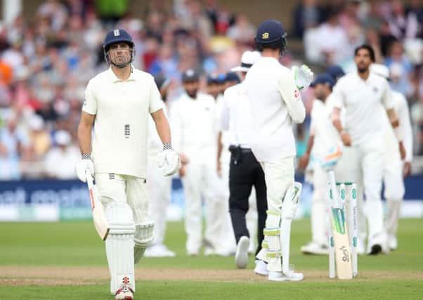 Struggling: England's Alastair Cook walks off after being caught during day two of the Third Test at Trent Bridge.