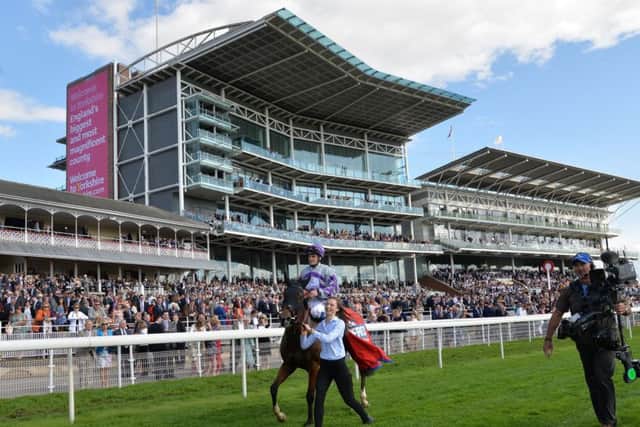 Jockey Callum Rodriguez celebrates after Nakeeta wins the Betfred Ebor during day four of the 2017 Yorkshire Ebor Festival at York Raceclast year. Picture: Anna Gowthorpe/PA.