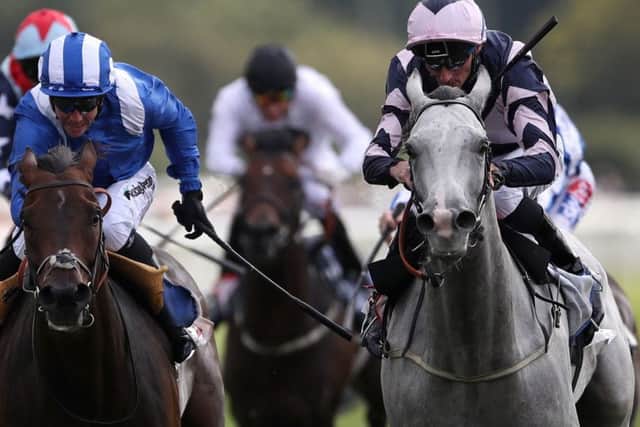 Lord Glitters ridden by Daniel Tudhope (right) wins the Strensall Stakes on day four of the Ebor festival.
