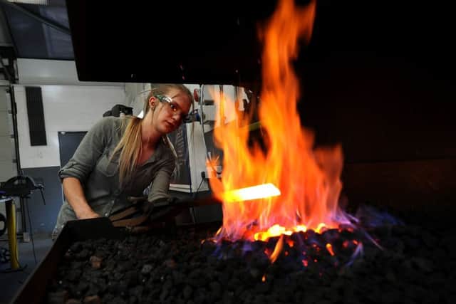 Blacksmith Katie Ventress pictured in her workshop at Hinderwell..24th August 2018 ..Picture by Simon Hulme