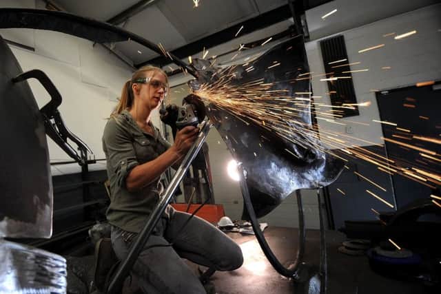 Blacksmith Katie Ventress pictured in her workshop at Hinderwell..24th August 2018 ..Picture by Simon Hulme