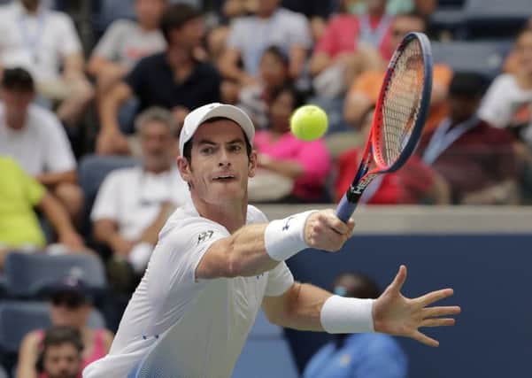 Andy Murray returns against James Duckworth during their first round of the US Open clash in New York. Picture: AP/Andres Kudacki
