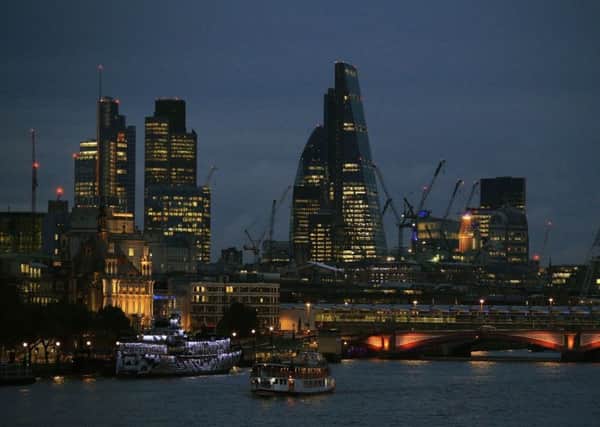 The City of London skyline at dusk, with Blackfriars Bridge in the foreground. Photo credit should read: Jonathan Brady/PA Wire