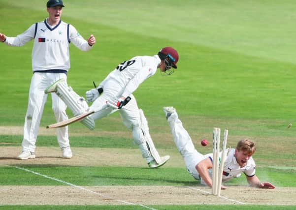 Missed chance: Acting Yorkshire captain David Willey, right, hits the stumps but his timing is just off as Somersets Tom Abell survives the run-out attempt. (Picture: Alex Whitehead/SWPx)