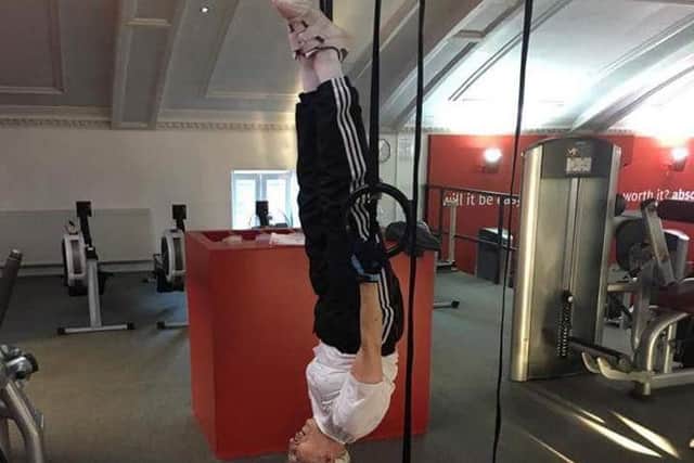 Marjorie can even hang upside down