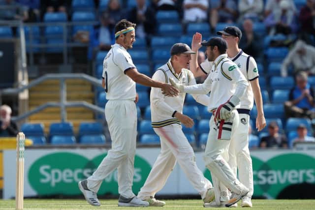 Yorkshire's Jack Brooks celebrates taking the wicket of Jamie Overton. Picture: John Clifton/SWpix.com