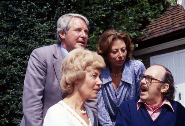 Eric Morecambe and Ernie Wise with their wives, Joan Bartlett and Doreen Wise in the garden of Eric's home in Harpenden.