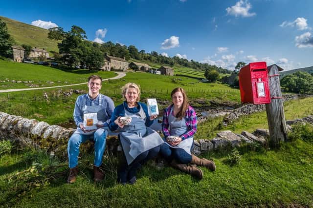 Date:31st August 2018.
Picture James Hardisty.
Yockenthwaite Farm, Buckden, Skipton, North Yorkshire,  has been a sheep farm for more than 150 years, the farm has now diversified into making breakfast cereal Yockenthwaite Farm Granola, which are being sold around Britain. Pictured Farmer Liz Hird, with her youngest son David, (left) daughter-in-law Ellen, whose married to their oldest son Eddie, who also helps to run the business.