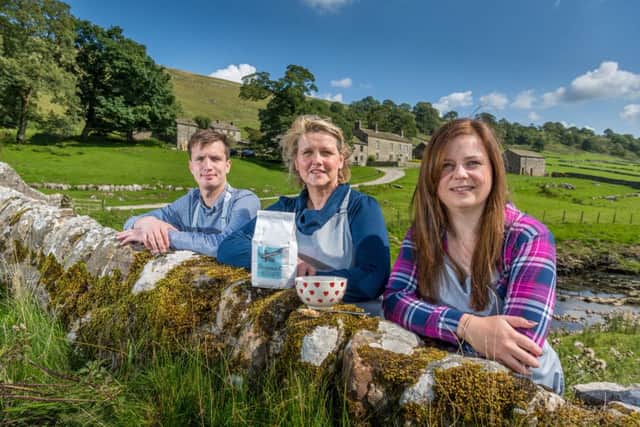 Date:31st August 2018.
Picture James Hardisty.
Yockenthwaite Farm, Buckden, Skipton, North Yorkshire,  has been a sheep farm for more than 150 years, the farm has now diversified into making breakfast cereal Yockenthwaite Farm Granola, which are being sold around Britain. Pictured Farmer Liz Hird, with her youngest son David, (left) daughter-in-law Ellen, whose married to their oldest son Eddie, who also helps to run the business.