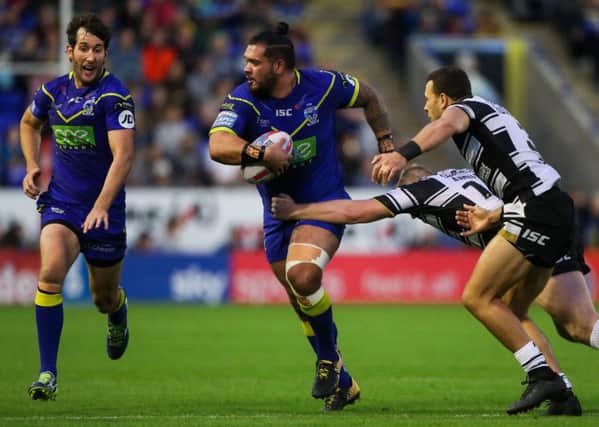 Warrington's Ben Murdoch-Masila is tackled by Hull FC's Jordan Abdull during last week's 80-10 thrashing by the hosts.