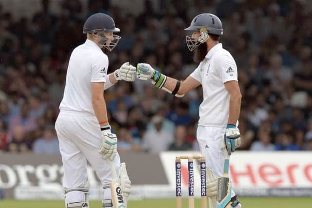 England's Joe Root (left) and Moeen Ali. Picture: Anthony Devlin/PA