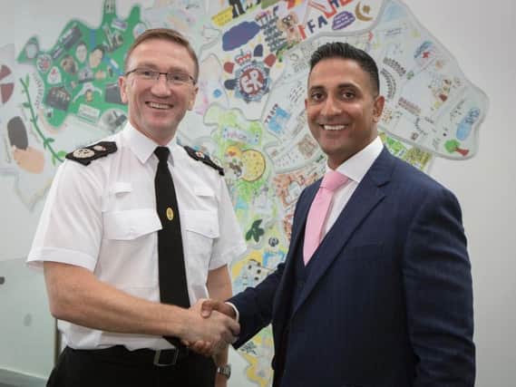 Greater Manchesters Chief Constable Ian Hopkins welcoming Mabs Hussain to the team.