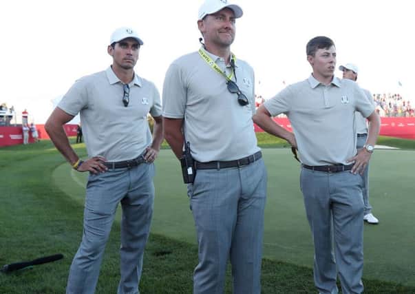 Europe's Rafael Cabrera-Bello, Ian Poulter and Matthew Fitzpatrick at Hazeltine two years ago. They are all vying for a captain's pick for the match in France later this month (Picture: PA)