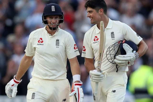 England's Alastair Cook (right) with Joe Root