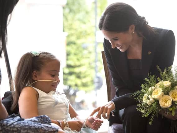 The  Duchess of Sussex meeting seven-year-old Matilda Booth during the annual WellChild Awards at the Royal Lancaster Hotel in London. Photo: Victoria Jones/PA Wire.