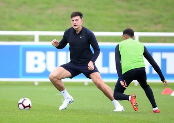 Harry Maguire (left) and Trent Alexander-Arnold during the England senior squad training session at St George's Park, Burton on Trent. Picture: Nigel French/Sportimage