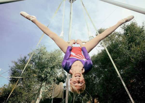 HIGH FLIER: Betty Goedhart who holds the record for being the Oldest Trapeze Artist as she appears in the latest edition of Guinness World Records.