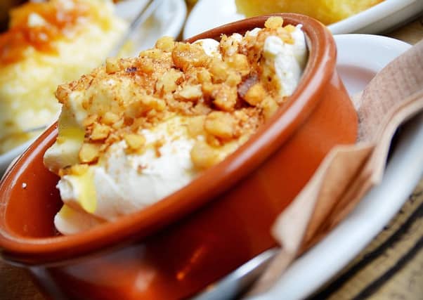 Various desserts including ravani galalkoboureko and yoghurt, honey and walnuts.