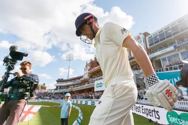 England's Alastair Cook walks onto the pitch at The Oval for his last international test match. Picture: John Walton/PA