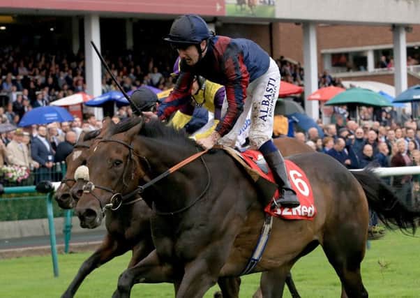 The Tin Man ridden by Oisin Murphy wins the 32Red Sprint Cup Stakes during 32Red Sprint Cup Day at Haydock Park.