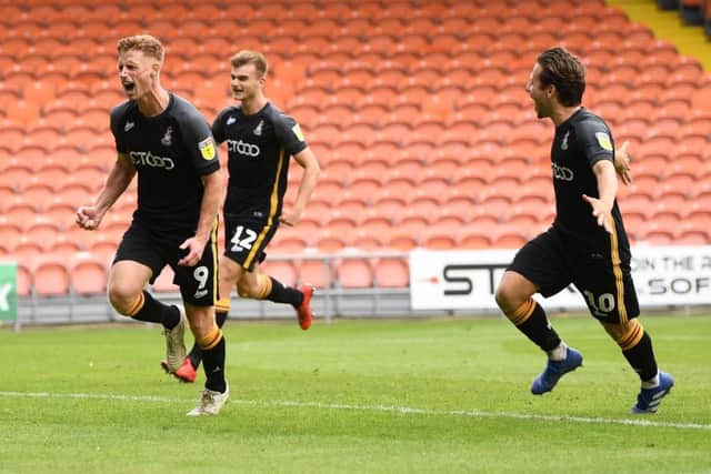 ON THE UP: Bradford's Eoin Doyle celebrates opening the scoring. for Bradford City at Bloomfield Road. Picture: Jonathan Gawthorpe.