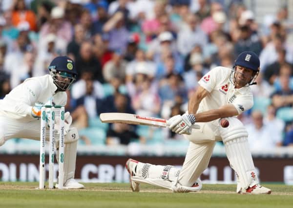 Englands Alastair Cook attempts a sweep during his last Test innings for his country that will extend into today after he finished 46 not out overnight at The Oval in the fifth and final Test against India (Picture: John Walton/PA Wire).