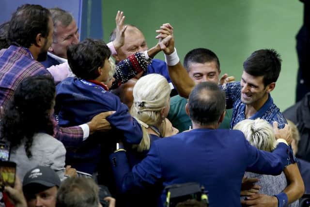 Novak Djokovic, of Serbia, celebrates after defeating Juan Martin del Potro, of Argentina, during the men's final of the U.S. Open tennis tournament in New York. (AP Photo/Jason DeCrow)