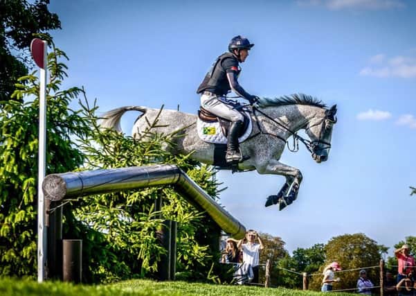 FLYING: Huddersfield's world no 1 Oliver Townend and Ballaghmor Class in action at Burghley, where the duo had to settle for a well-earned second place. Picture: Michael Harris.