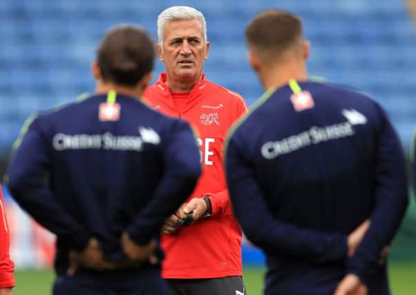 Switzerland manager Vladimir Petkovic talks to his players during a training session on Monday at King Power Stadium, Leicester (Picture: Mike Egerton/PA Wire).