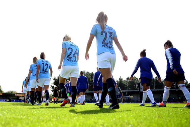 General view of Manchester City and Chelsea walking out during the FA Women's Super League match at Kingsmeadow, London on Sunday: (Picture: Steven Paston/PA Wire)