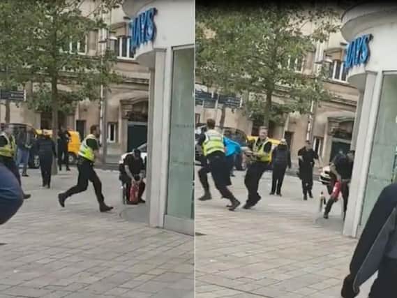 Police used fire extinguishers on the man when he went into Barclay's in Hull